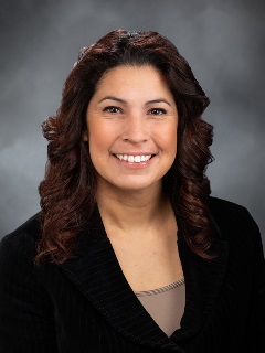 Legislative headshot of Monica Stonier against a gray photo background